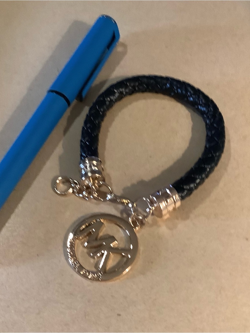 MK Black Braided Leather Bracelet with Gold Logo Charm